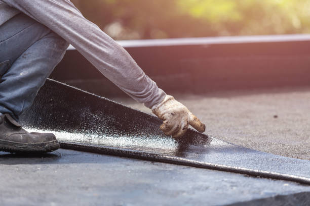 Professional Basement Waterproofing technician working in Hartford, WI